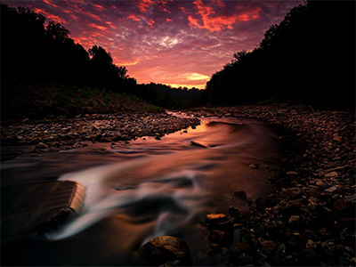 Sunrise at Patapsco, stream flowing into the distance