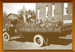 Early educational float on a flat bed truck: If You Want Good Hunting, Obey Game Laws