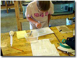 Student working on the classroom project