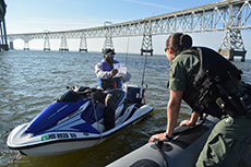 NRP Officer Kristen McFarland assists boater