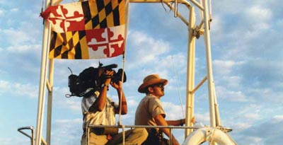 NRP Officer on his vessel with camera man