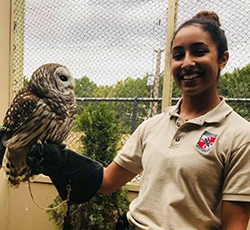 MCC crew member with Scales and Tails Owl