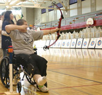 Wisconsin State Tournament - student archer in wheelchair, courtesy of Jon Gauthier