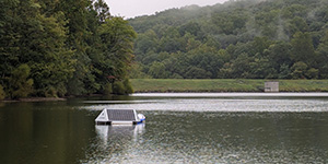 Powered by solar panels, the sonicator buoy sits in Hunting Creek Lake in Frederick County. Photo by Joe Zimmermann/DNR