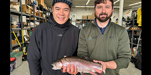 Andrew Tsui, founder and president of the Ike Jime Federation, and Maryland DNR Secretary Josh Kurtz display a trout processed with ike jime. Photo by Winn Brewer, Maryland DNR. 