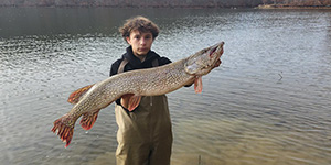 Luca Tucciarella will certainly have fond memories of the day he caught this large northern pike at Loch Raven Reservoir. Photo by Vincent Tucciarella