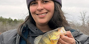 Angelina Watts holds up a pretty Choptank River yellow perch.