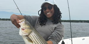 This happy angler pulled in a keeper-sized striped bass that was destined for the dinner table.