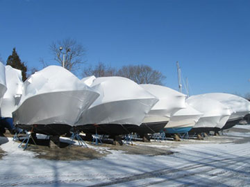 Boats at a marina in shrinkwrap