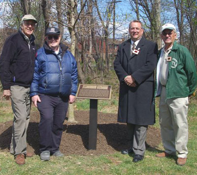 Pictured (l to r): Kirk P. Rodgers, grandson of Maryland's first State Forester; John S. Ayton, Maryland's 3rd State Forest Tree Nursery Manager, Steve Koehn, Maryland State Forester; and Silas Sines, Jr., son of Maryland's 2nd State Forest Tree Nursery Manager, G. Silas Sines.