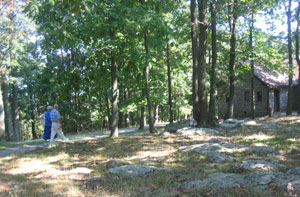 CCC Alumni and wife, walking to the Tea House, one of the buildings erected by the CCC at Gambrill State Park in the thirties.