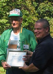 Keith Paugh, CCC veteran who served at the New Germany CCC Camp S-52 receiiving a commemorative Centennial certificate from DNR Secretary  Ron Franks, Sept. 17, 2006