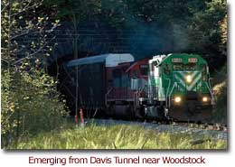 A train emerging from Davis Tunnel near Woodstock.