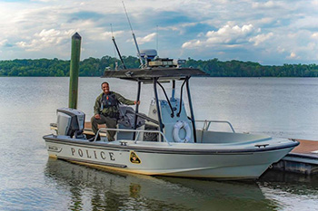 NRP officer checking a fishing license