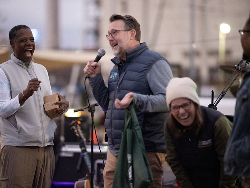 Winners of the inaugural Baltimore Rec Trek scavenger hunt pose during a welcome party Oct. 28.