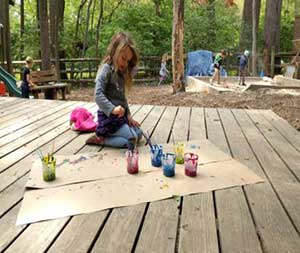 Creating art outdoors at Audubon Pre-K