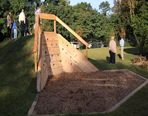 Climbing wall built into a hill, Johns Hopkins Homewood Early Learning Center