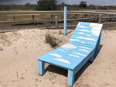 lounge chair painted with clouds