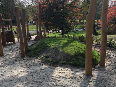 Sand area with tall poles as obsitcals