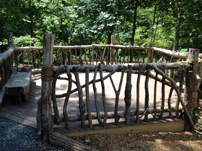 Deck with railings made of tree branchs