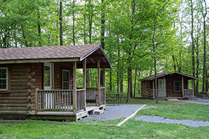 Camper cabins, small cabins with covered front porch