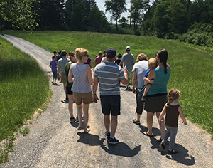 Group walking to their bus at Fort Frederick State Park
