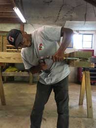VCC member working as a carpenter