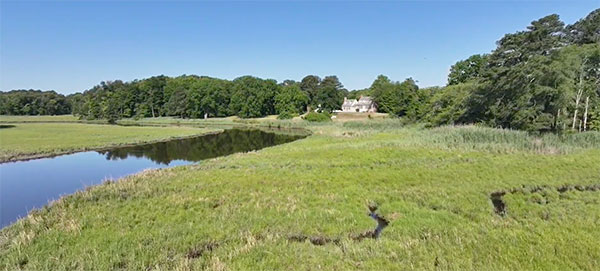 Main house from the river side. You can see marsh and forest all around