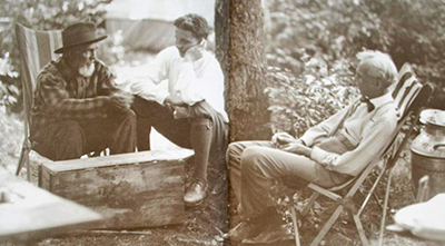 Henry Ford talking with young Henry Sines at Muddy Creek Campsite