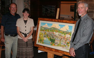 Mark Stutzman, the artist is standing to the right of the painting. Chuck Thomas, retired Maryland State Park Ranger, and Erin Thomas, State Park manager for Casselman River Bridge State Park and New Germany State Park, are standing to the left of the painting.
