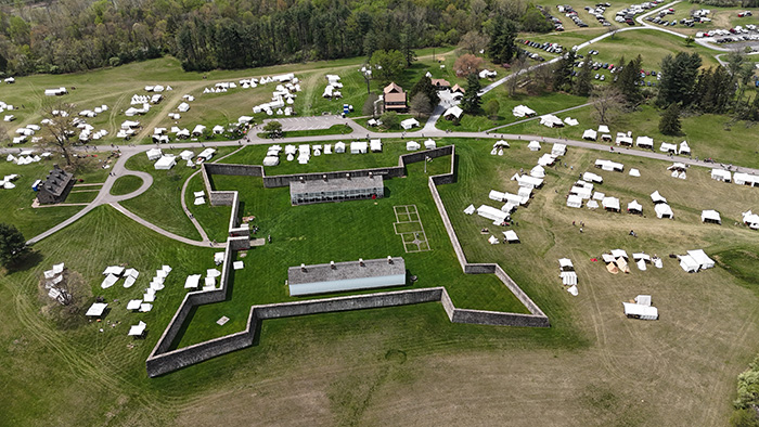 View of the Fort from a drone with tents surrounding the area